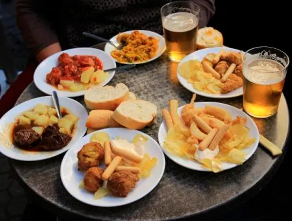 Traditional Spanish tapas on a bar counter in Seville